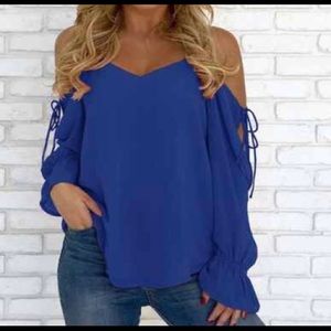 Women’s cold shoulder NWOT runs small.